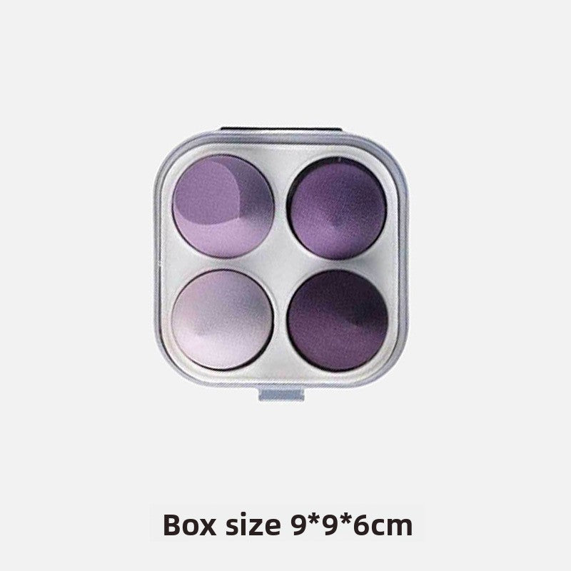 Small rectangular box with four round compartments on a white background