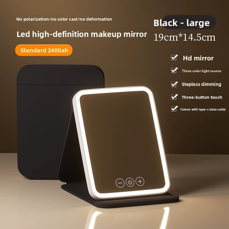 Black high-definition makeup mirror with LED lighting on a brown background